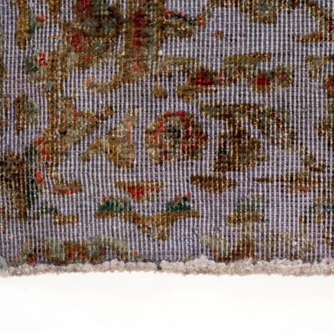 Persian Art Design Teppich mit farbigem Muster auf lila farbenem Webgeflecht